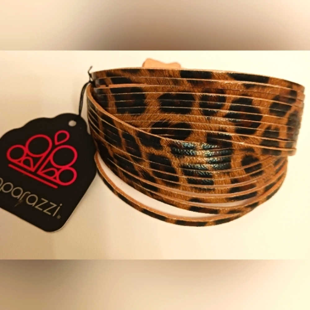 NWT Reversible Faux Leather Bracelet with 2 snap size options.